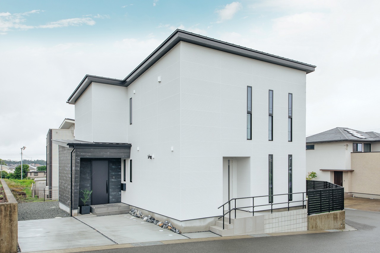 ほどよい距離感が心地いいスタイリッシュな半二世帯住宅
